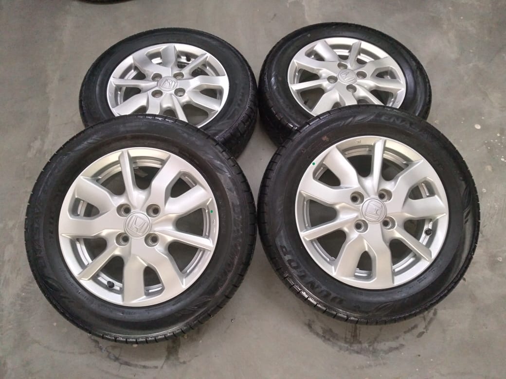 ready velg oem new brio ring 14 pcd 4×100 plus ban dunlop kondisi 80%