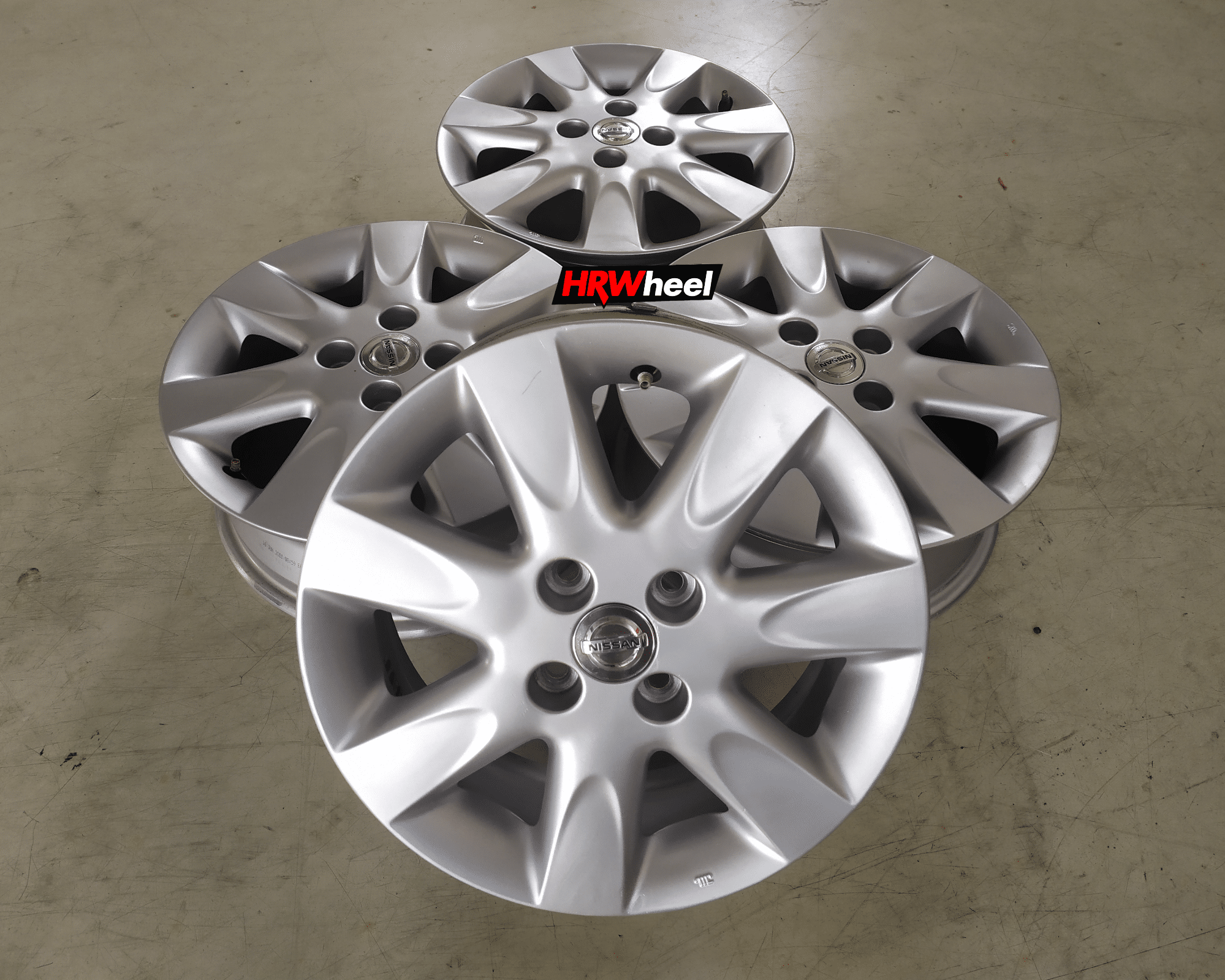 VELG BEKAS OEM NISSAN MARCH RING 15×5,5 H:4×100 ET:50 SILVER