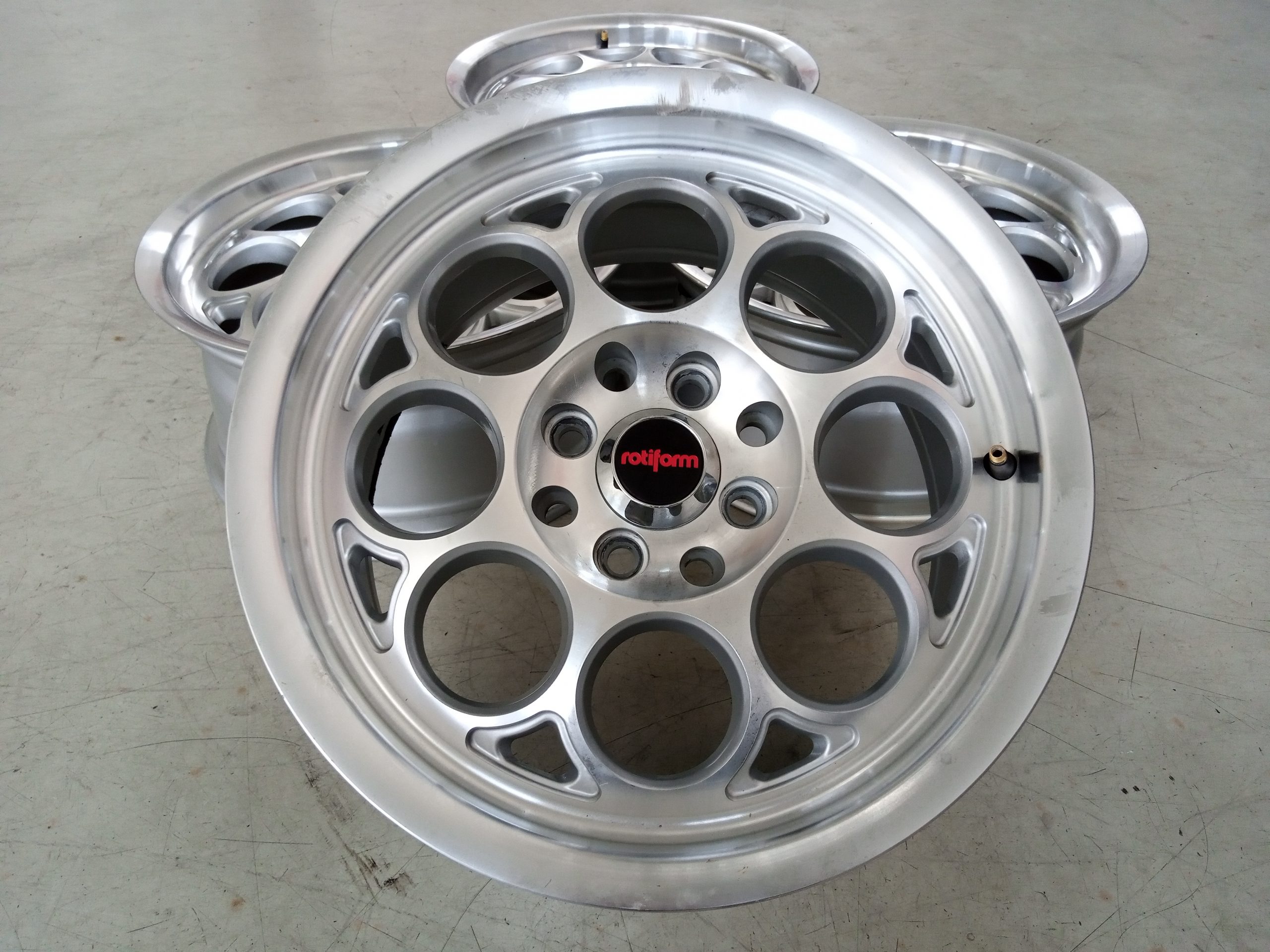 VELG BEKAS REP ROTIFORM RING 15×7 H:8×100/114,3 ET:38 SILVER POLISH